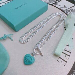 Tiffany & Co. Silver Necklace with Blue Heart Pendant